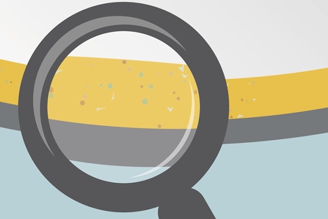 Looking at oil through magnifying glass