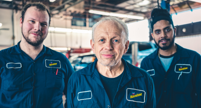 Three men in shop