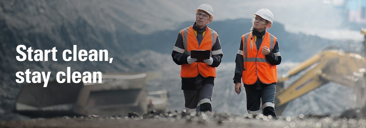 two people inspecting construction site