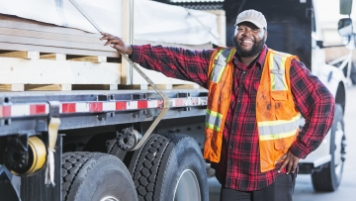 Man standing by truck
