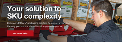 Man pouring oil from PitPack rack